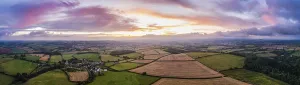 Remote Controlled Aircrafts Drucke: Sunset over the fields from a drone