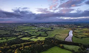 Aerial View Of Castle Drucke: Sunset over Fields and Farms from a drone
