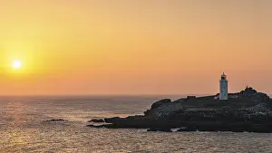 Evening Light In England Drucke: Sunset over Godrevy Lighthouse