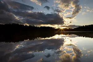 Norway Panorama Drucke: Sunset over a lake near Ormemyr