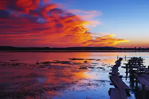Cloudy Evening Sky Drucke: Sunset landscape and the reflections of the clouds on water