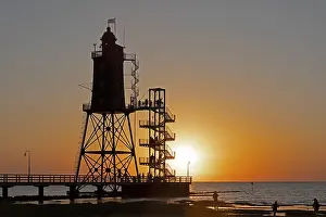 Backlit Lighthouse Photo Drucke: Sunset, lighthouse Obereversand