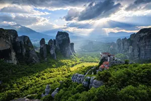 Evening Sky In Europe Drucke: Sunset over monastery of Rousanou and Monastery of St
