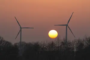 Eco Friendly Energy Source Drucke: Sunset mood with wind turbines