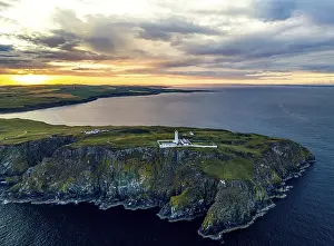 Evening Atmosphere Scotland Drucke: Sunset over Mull of Galloway Lighthouse from a drone