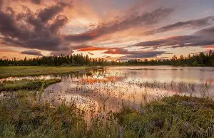 Atmospheric Evening Sky Shots Drucke: Sunset, orange clouds reflected in the lake