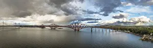 UNESCO World Heritage Site Panorama Drucke: Sunset Panorama of Rain clouds over Forth Bridge from a drone