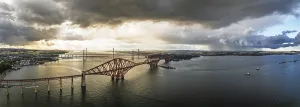 UNESCO World Heritage Site Panorama Drucke: Sunset Panorama of Rain clouds over Forth Bridge from a drone