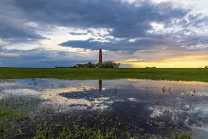 Baltic Sea Evening Atmosphere Drucke: Sunset reflection at Flugge lighthouse