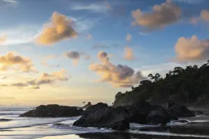 Lava Rock Landscape Drucke: Sunset on sandy beach, lava rocks