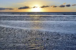 Northern German Beaches Drucke: Sunset on sandy beach with wave-like structures