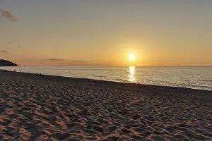 Atmospheric Sunset Mood Drucke: Sunset by the sea, sandy beach