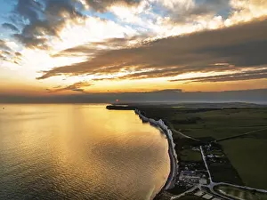 British Coastal Landscape Drucke: Sunset over Seven Sisters Cliffs from a drone