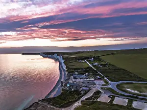 English Channel Coastline Drucke: Sunset over Seven Sisters Cliffs from a drone