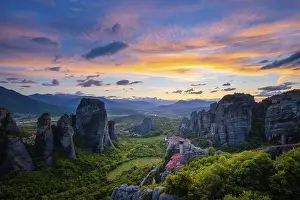 Sunset In Greece Drucke: Sunset sky and monastery of Rousanou and Monastery of St
