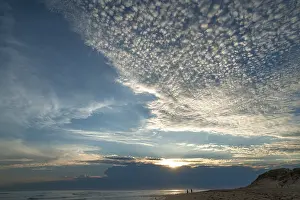 Backlit Coastal Photography Drucke: Sunset with small cirrocumulus clouds