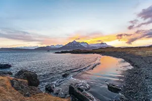 Icelandic Fjord Landscape Drucke: Sunset over snow-capped mountains