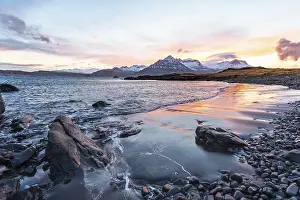 Winter In Iceland Drucke: Sunset over snow-capped mountains