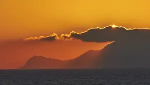Sicily Sunset Drucke: Sunset, sun disc behind clouds