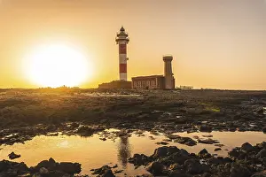 Evening Sun On The Coast Drucke: Sunset at the Toston Lighthouse