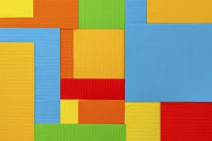 Deserted Colorful Scene Drucke: Surface covered with multiple colorful paper sheets as an abstract background composition