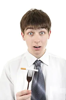 White Background Cutout Drucke: Surprised Young Man with Cigarette on the Fork