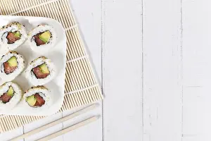 Top Down View Of Sushi Drucke: Sushi inside out rolls with salmon