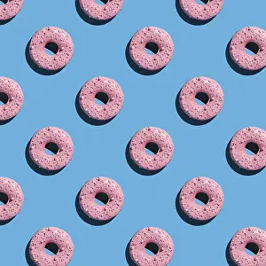 Bakery Goods Photography Drucke: Sweet donuts pattern on a blue background