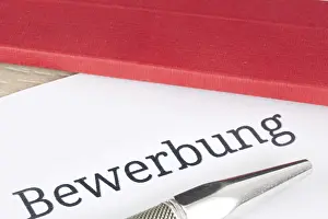 Job Application Concept Drucke: Symbolic image of an application: Close-up of documents for an application