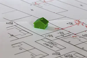 Model House Drucke: Symbolic image of building: Model house on a development plan