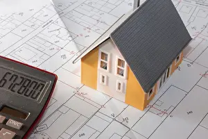 Model House Drucke: Symbolic image of building: Model house on a development plan