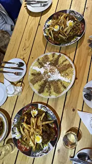 North African Cuisine Drucke: Table spread of moroccan dishes for sharing