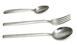 Food Photography Studio Setup Drucke: Table ware, spoon, fork and small spoon isolated on white background