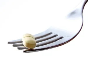 Weight Loss Drucke: Tablets on a fork