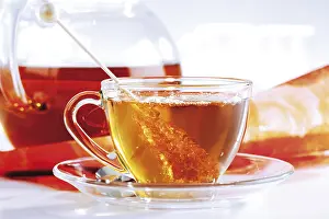 Tea In A Cup Drucke: Tea poured into a cup
