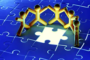 Successful Collaboration Drucke: Team work on solving puzzle problem