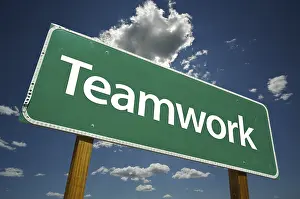 Blue Sky Symbolism Drucke: Teamwork road sign with dramatic blue sky and clouds