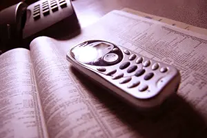 Telecommunication Equipment Drucke: Telephone on a directory