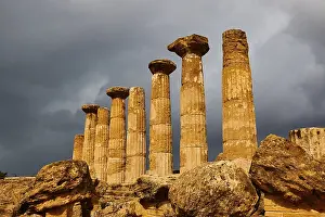 Agrigento Sicily Italy Drucke: Temple of Heracles, ancient columns under dramatic stormy sky