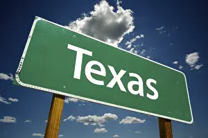 Atmospheric Billboard Image Drucke: Texas road sign with dramatic clouds and sky
