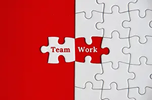 Teamwork Concept Drucke: Text on missing jigsaw puzzle - Team Work