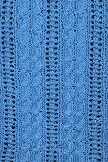 Handicraft Detail View Drucke: Texture of knitting close up as a background
