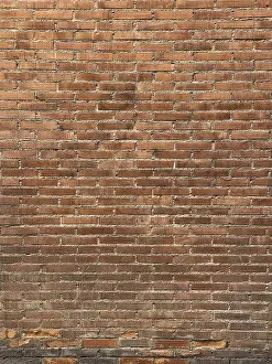 Urban Exterior View Drucke: A textured red brick wall with a consistent horizontal pattern