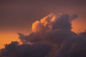 Cloudy Atmospheric Light Drucke: Thundercloud illuminated by the evening sun