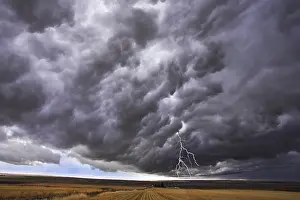 American National Park Scenery Drucke: The thundercloud and lightning above boundless plain in state of Idaho