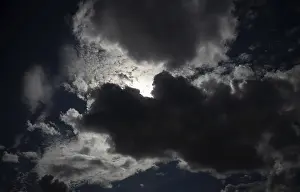 Stormy Atmosphere Drucke: Thundercloud pushes in front of the sun