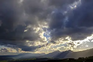 Stormy Atmosphere Europe Drucke: Thunderstorm, dark clouds over the mountains