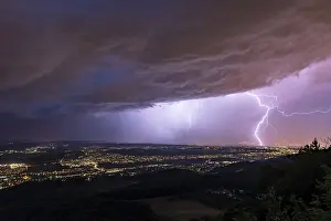 Central Europe Severe Weather Drucke: Thunderstorm lightning over the city of Basel