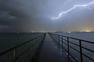 Stormy Atmosphere Germany Drucke: Thunderstorms in the evening in the summer