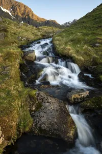 Stornappstinden Summit View Drucke: A torrent flows down the mountain
